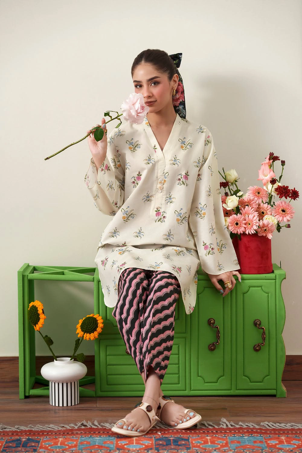 Local model — cream floral suit